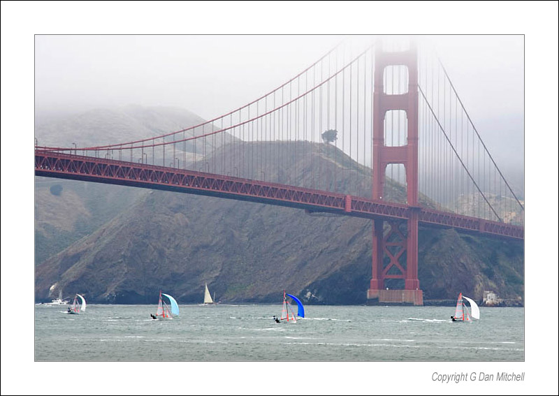 GoldenGateBridgeSailboats2005|07|03: Sailboats Under the Golden Gate Bridge. San Francisco, California.  July 3, 2005. © "Copyright g Dan Mitchell".    keywords: san francisco golden gate bridge sailboats color photograph california