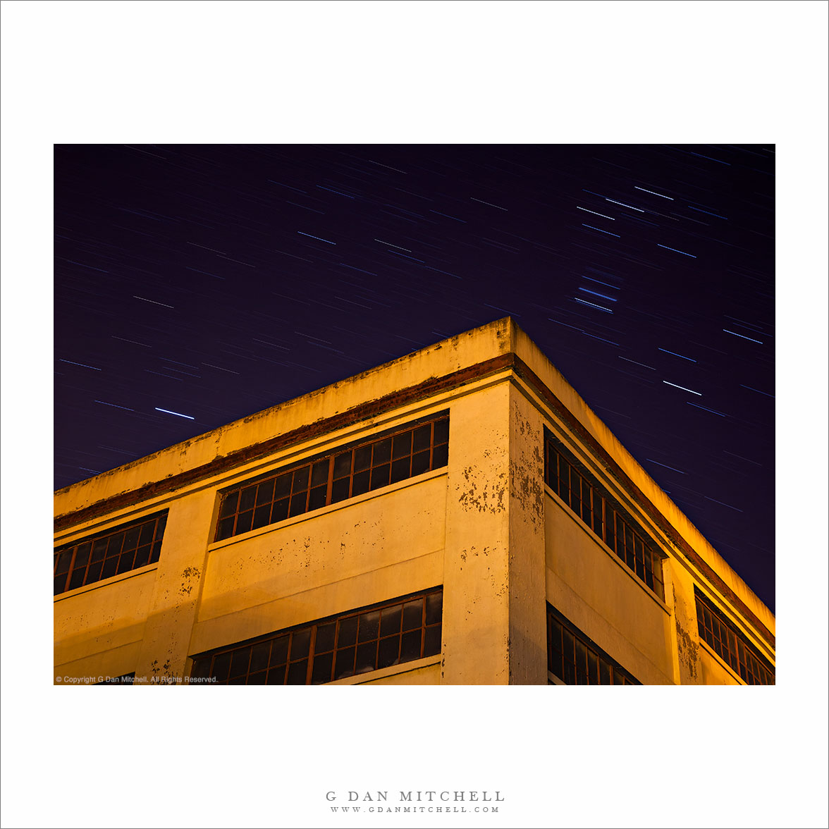 Yellow Building With Dark Windows, Star Trails