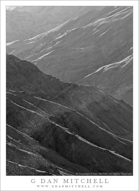 Trail Canyon - Morning light angles across eroded ridges and gullies on lower slopes of the Panamint Range above Trail Canyon, Death Valley National Park.