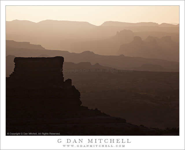 Towers, Morning Light - Morning light silhouettes towers and ridges, Arches National Park, Utah