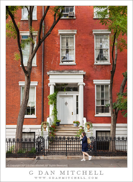 Woman Walking, Brick Building