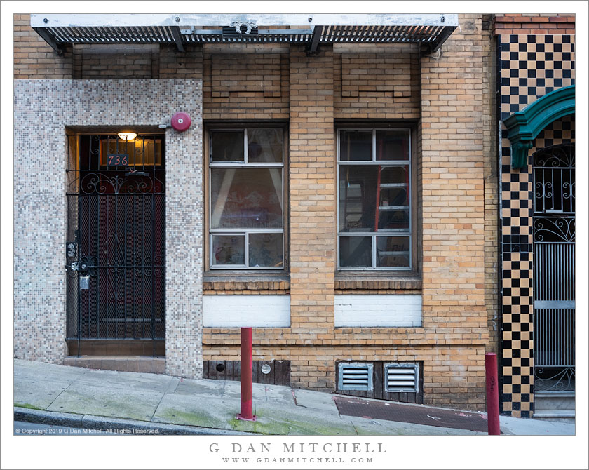 Sidewalk and Brick Building