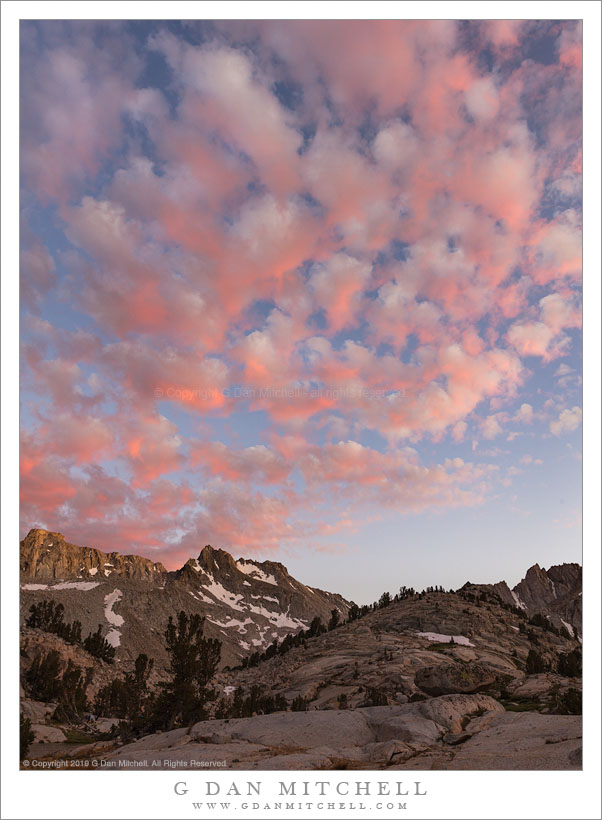 Peaks And Sunset Clouds