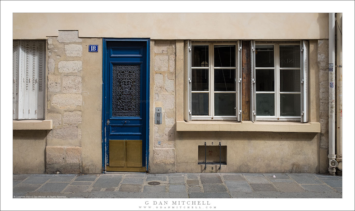 Blue Door, Wall, and Sidewalk