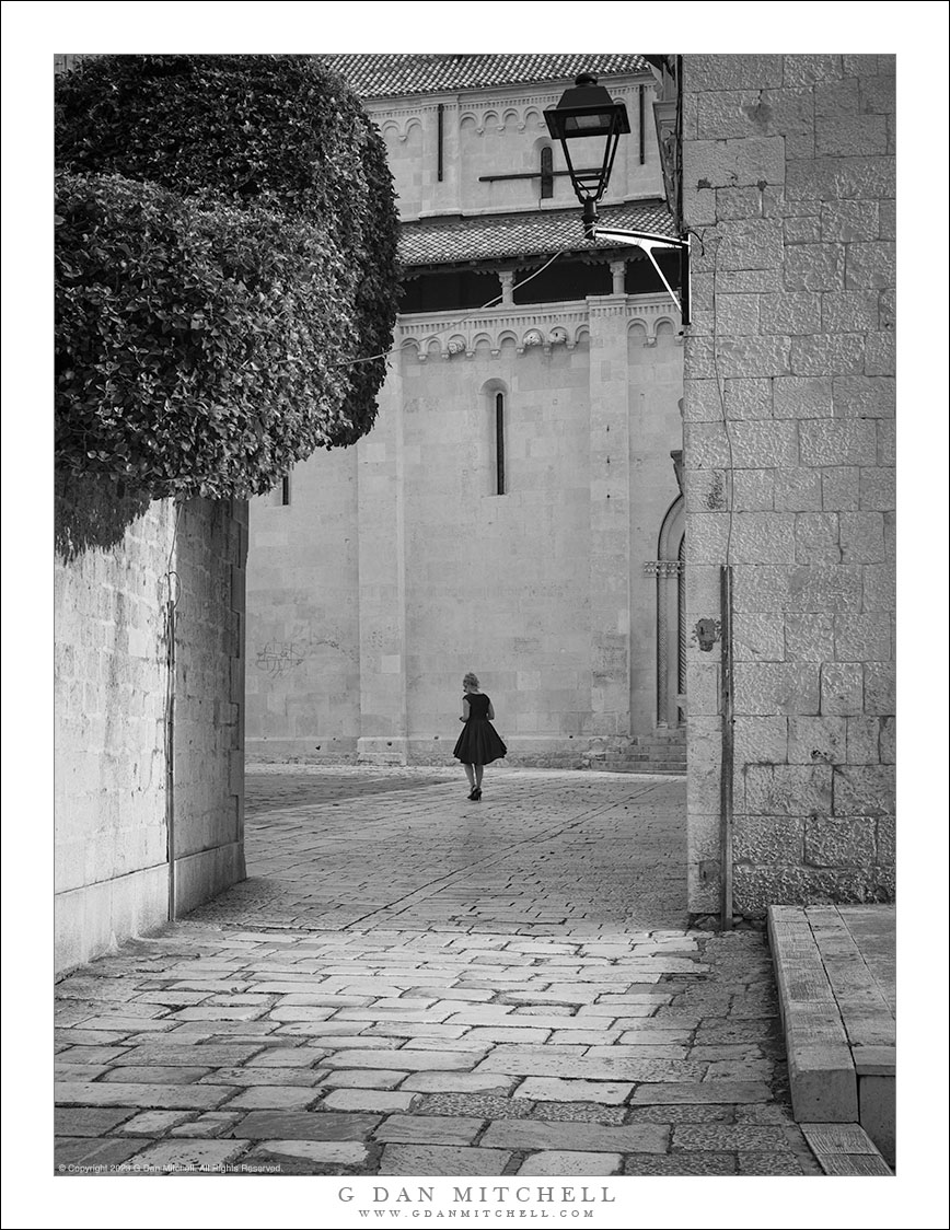 Woman Crossing The Square