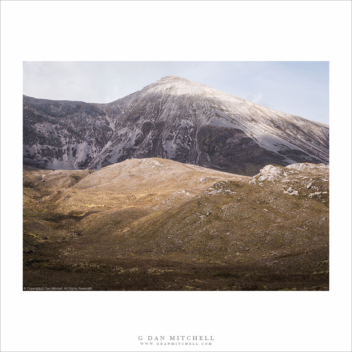 Snow-dusted Highlands Peak